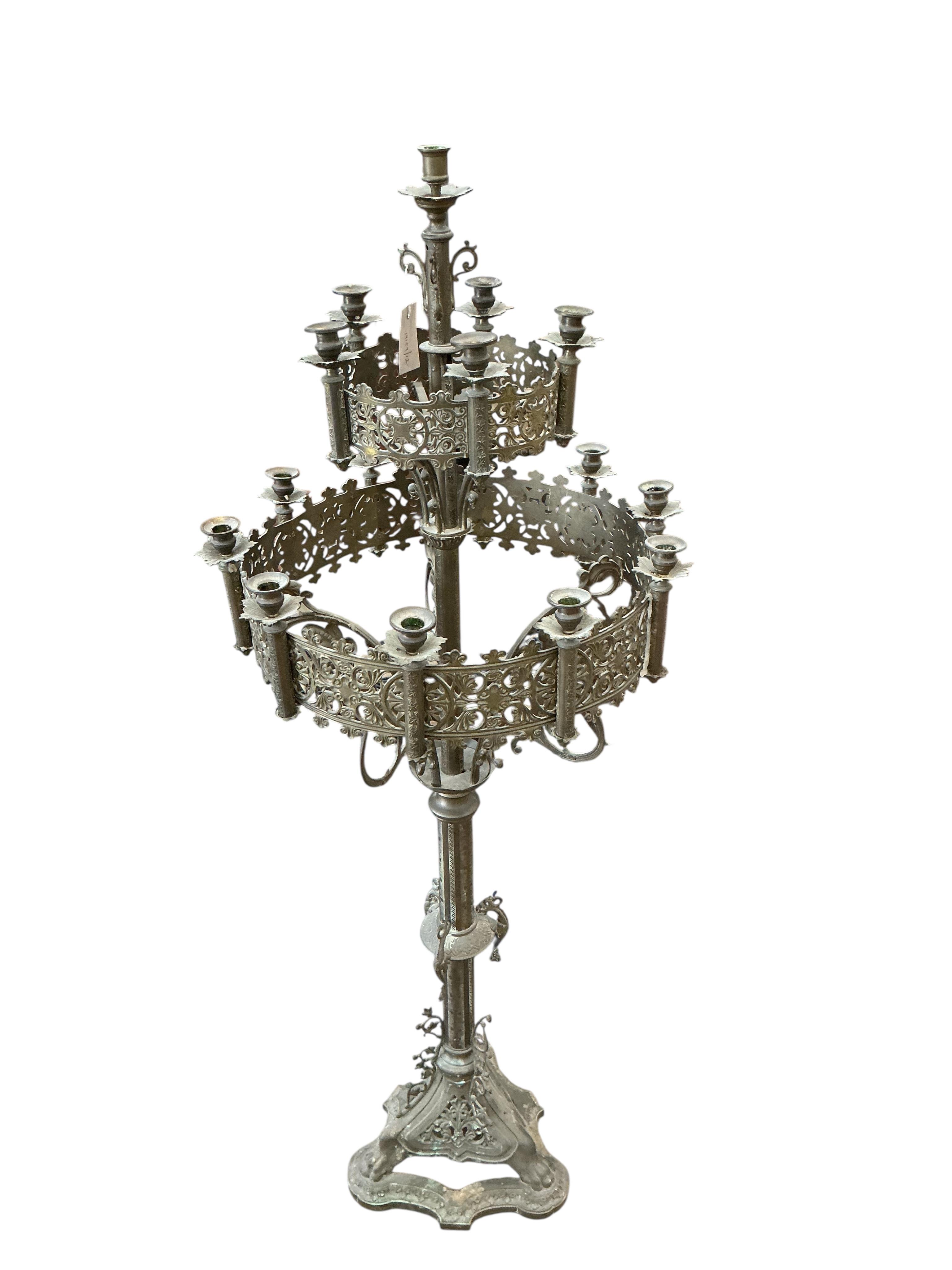 A late 19th century French pierced brass ecclesiastical candlestand, height 152cm